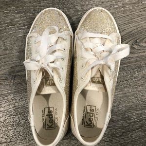 Keds girls gold and cream sparkle shoes.